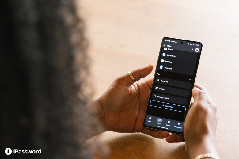 Someone using it on a phone.