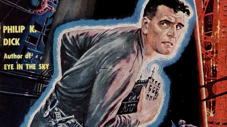 A snippet of the book cover of the Ace Books print of The Variable Man, showing a man in work coveralls clutching a radio device