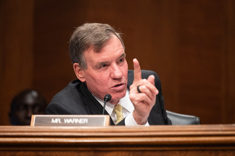 WASHINGTON - JUNE 12: Sen. Mark Warner, D-Va., speaks during the Senate Banking, Housing and Urban Affairs Committee hearing on 