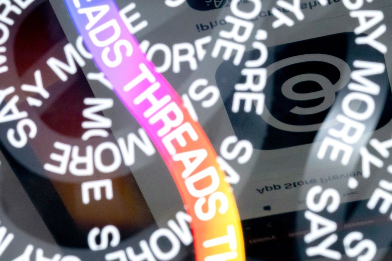 This photo illustration created  in Washington, DC, on July 6, 2023, shows the logo for Threads, an Instagram app, reflected in its opening page. More than 10 million people have signed up to Threads, Meta's rival to Twitter, within the first few hours of its launch, the company's CEO Mark Zuckerberg said July 6. The app went live on Apple and Android app stores in 100 countries at 2300 GMT on July 5, 2023, and will run with no ads for now, but its release in Europe has been delayed over data privacy concerns. (Photo by Stefani Reynolds / AFP) (Photo by STEFANI REYNOLDS/AFP via Getty Images)