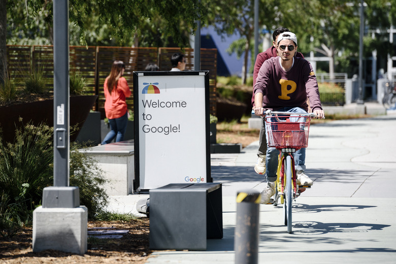 MOUNTAIN VIEW, CA - MAY 01: People ride bikes past signage on the Google campus as Google workers inside hold a sit-in to protest sexual harassment at the company, on May 1, 2019 in Mountain View, California. (Photo by Michael Short/Getty Images)