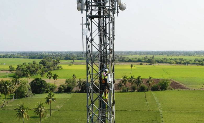 A worker connecting a terminal.