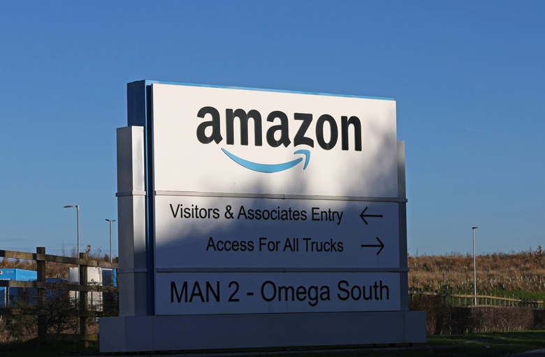 WARRINGTON, ENGLAND - DECEMBER 07:  The Amazon logo is displayed outside the Amazon UK Services Ltd Warehouse on December 07, 2022 in Warrington, England . 