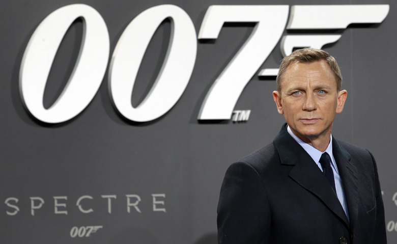 FILE - In this Oct. 28, 2015, file photo, actor Daniel Craig poses for the media as he arrives for the German premiere of the James Bond movie 'Spectre' in Berlin, Germany. (AP Photo/Michael Sohn, File)