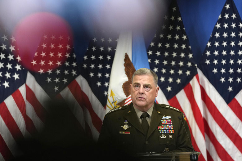 FILE - Chairman of the Joint Chiefs of Staff U.S. General Mark Milley addresses the media during a meeting of NATO defense ministers at NATO headquarters in Brussels, on June 15, 2023. The top U.S. military official on Friday, July 14, encouraged Japan's recent commitment to doubling its defense spending over the next five years, calling Tokyo's new, controversial push for a stronger military a crucial part of efforts to confront rising threats from North Korea and China. (AP Photo/Virginia Mayo, File)