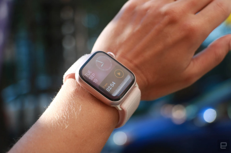 A wrist wearing an Apple Watch. 