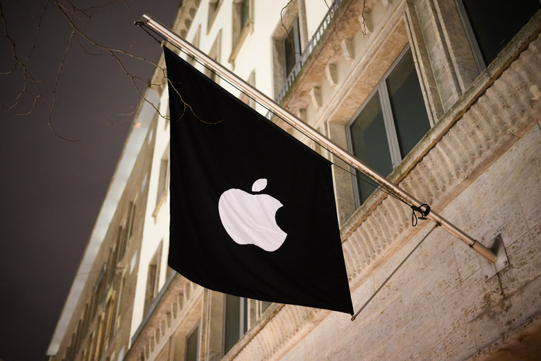 19 December 2023, Lower Saxony, Hanover: A flag hangs in front of the Apple Store in the city. Photo: Julian Stratenschulte/dpa (Photo by Julian Stratenschulte/picture alliance via Getty Images)