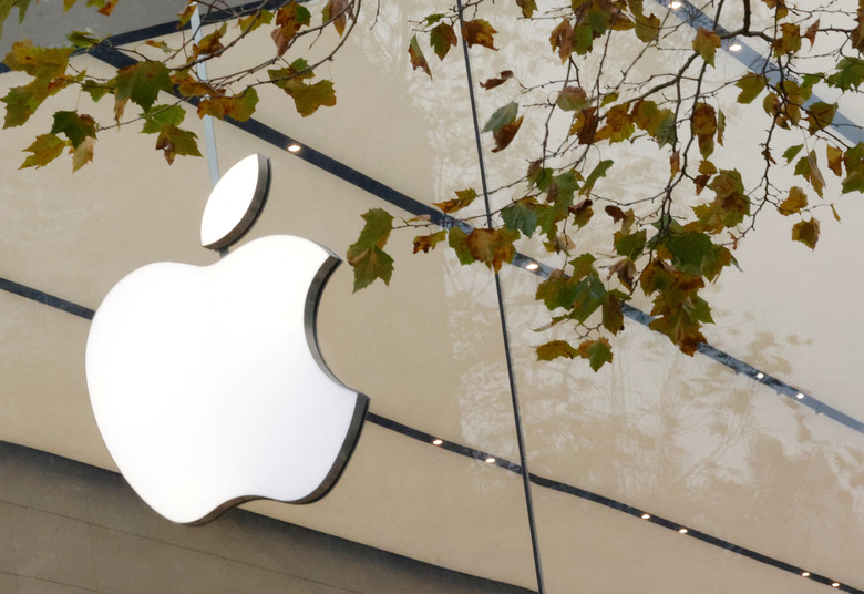 FILE PHOTO: The Apple Inc logo is seen at the entrance to the Apple store in Brussels, Belgium November 28, 2022. REUTERS/Yves Herman/File Photo