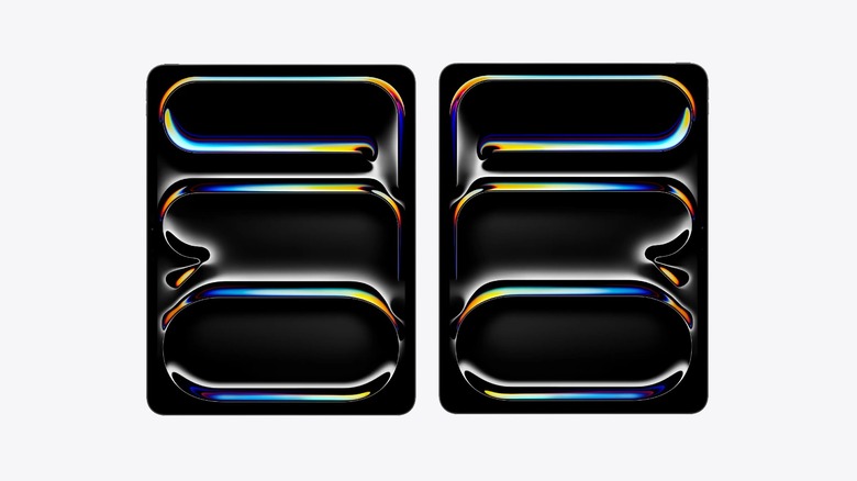 Two iPad Pro devices pictured side by side on a white background, with a graphic of rainbow oil slick style curved lines against a black background