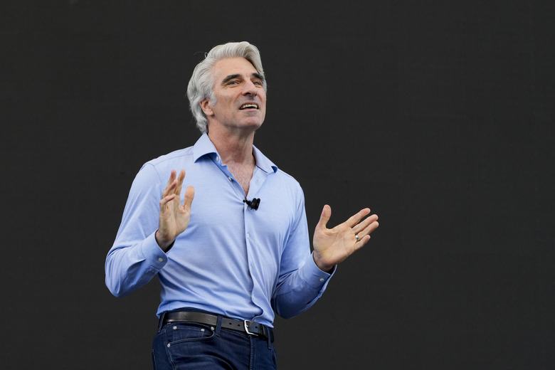 Craig Federighi, Apple's senior vice president of software engineering, speaks during an announcement of new products at the Apple campus in Cupertino, Calif., on Monday, June 10, 2024. (AP Photo/Jeff Chiu)