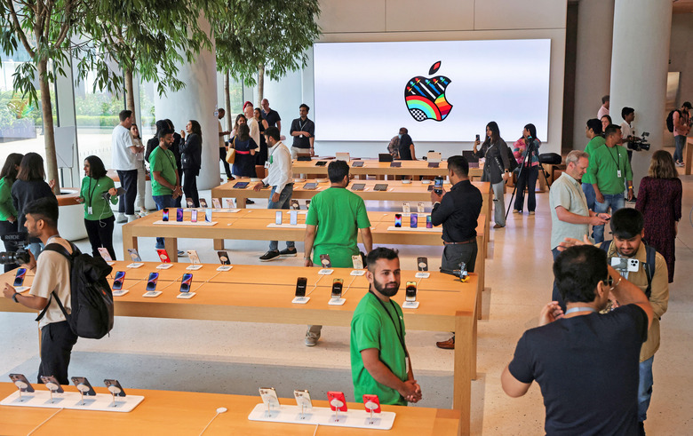 Bloggers and other journalists attend a media preview inside India's first Apple retail store, a day ahead of its launch in Mumbai, India, April 17, 2023. 