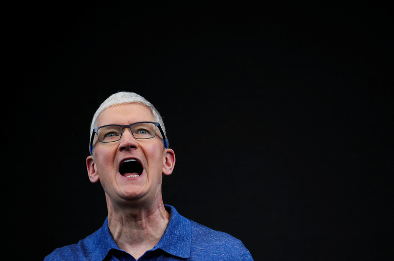 Apple CEO Tim Cook attends the annual developer conference event at the company's headquarters in Cupertino, California, U.S., June 10, 2024. REUTERS/Carlos Barria