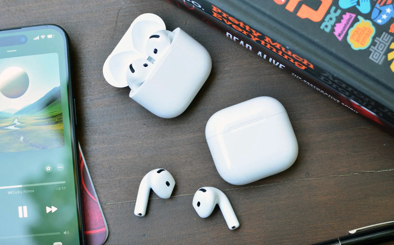 Some earbuds on a table.