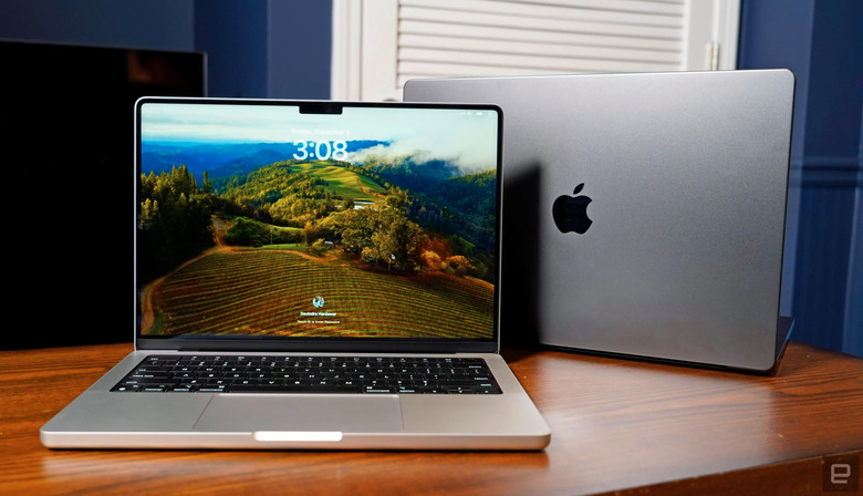 An image of two laptops on a table. 