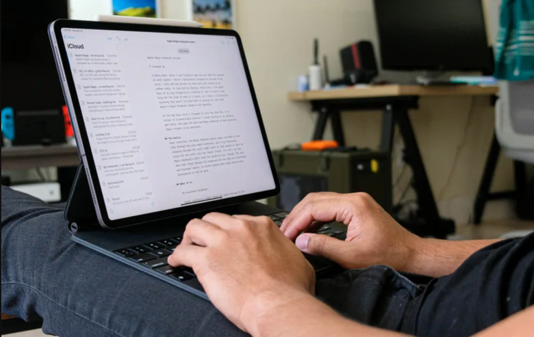 An image of the keyboard on a lap. 