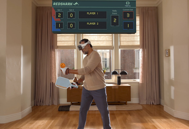 A guy using the headset with a controller.