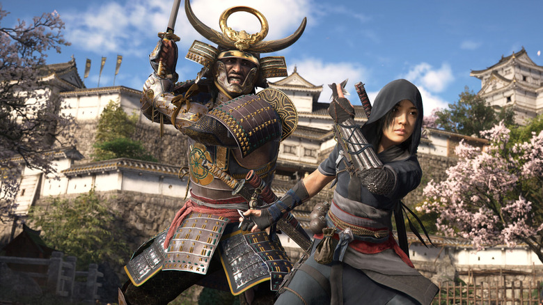 A still from Assassin's Creed Shadows showing two characters posed in fighting positions 