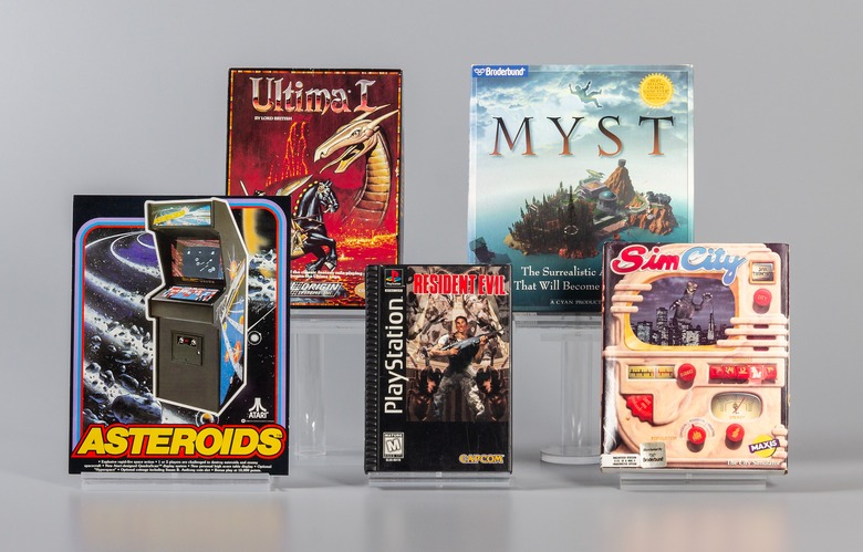 World Video Game Hall of Fame 2024 inductees with cover art for Asteroids, Myst, Resident Evil, SimCity and Ultima.
