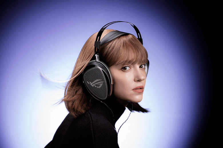 A lady wearing headphones.