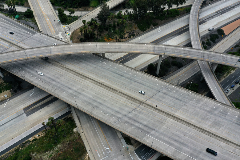 An empty freeway intersection is seen two days before Earth Day, after Los Angeles’ stay-at-home order caused a drop in pollution, as the global outbreak of the coronavirus disease (COVID-19) continues,  in Pasadena, near Los Angeles, California, U.S., April 20, 2020.  REUTERS/Lucy Nicholson REFILE - CORRECTING LOCATION