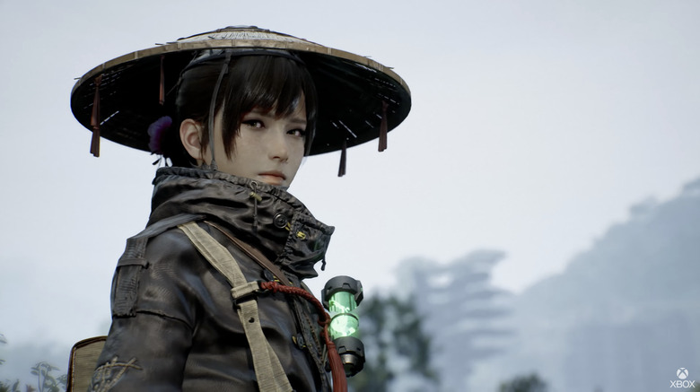 Emma from Beast of Reincarnation looking at the camera.