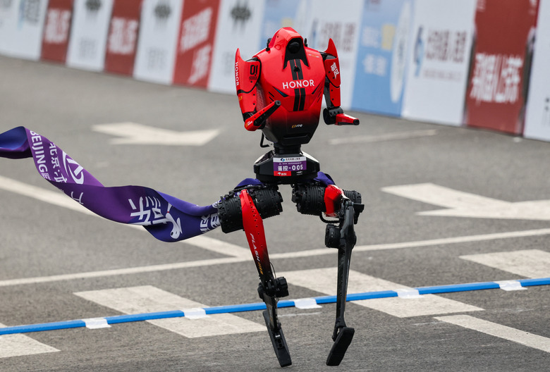 A Lightning humanoid robot by Honor crosses the finish line of the second Beijing E-Town Half Marathon and Humanoid Robot Half Marathon in Beijing, China April 19, 2026. REUTERS/Maxim Shemetov