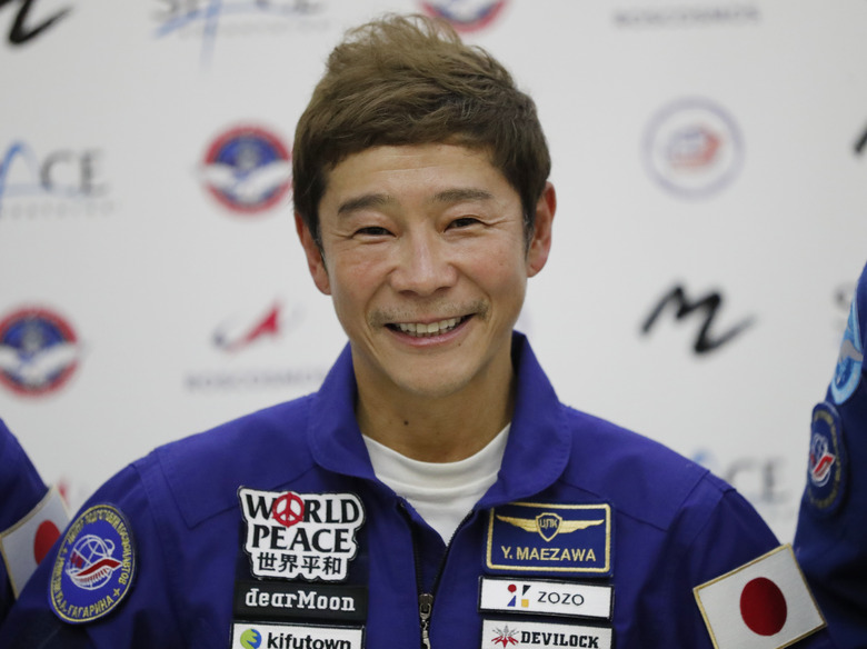 FILE - Space flight participant Yusaku Maezawa attends a news conference ahead of the expedition to the International Space Station at the Gagarin Cosmonauts' Training Center in Star City outside Moscow, Russia, on Oct. 14, 2021. Japanese billionaire Maezawa on Saturday, June 1, 2024, cancelled his planned flight around the moon on a Space X spaceship because of uncertainty about when it may be possible. (Shamil Zhumatov/Pool Photo via AP, File)