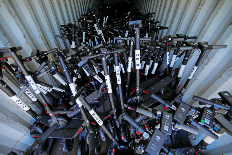 Some of the thousands of BIRD scooters are shown at Scoot Scoop after the company impounded the devices when contracted by private property owners who no longer want them being left on their property in San Diego, California, U.S., July 29, 2019. Picture taken July 29, 2019.    
