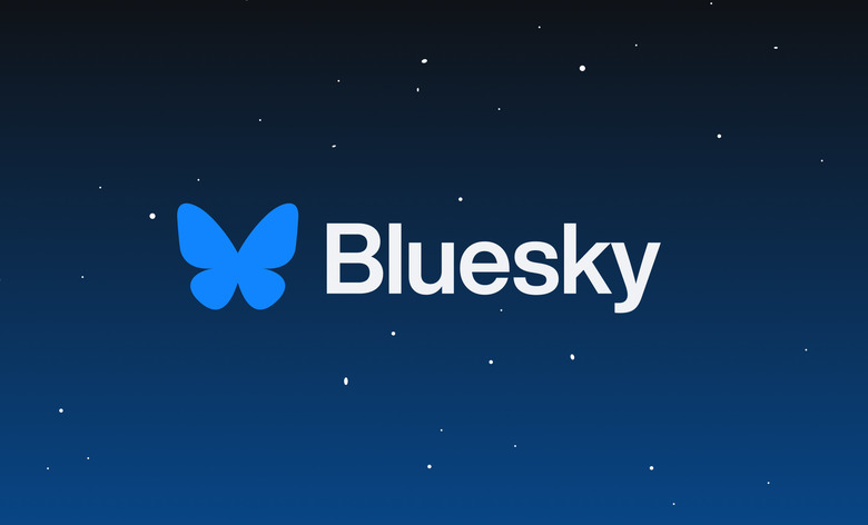 The Bluesky logo on a graphic of a night sky