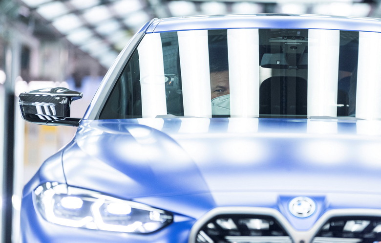 German Economic and Climate Protection Minister Robert Habeck gets driven in a BMW i4 electric car during his visit at the BMW plant in Munich, Germany, January 20, 2022. REUTERS/Lukas Barth