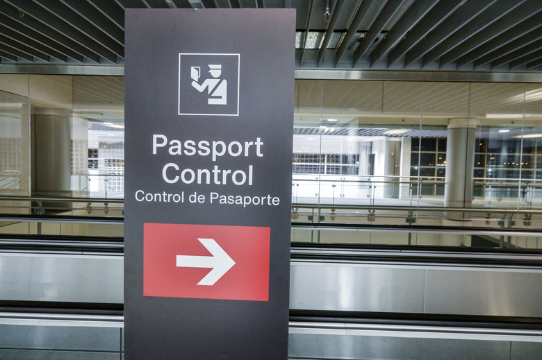 Miami, Florida, MIA Miami International Airport, terminal, directional arrow passport control. (Photo by: Jeffrey Greenberg/Universal Images Group via Getty Images)