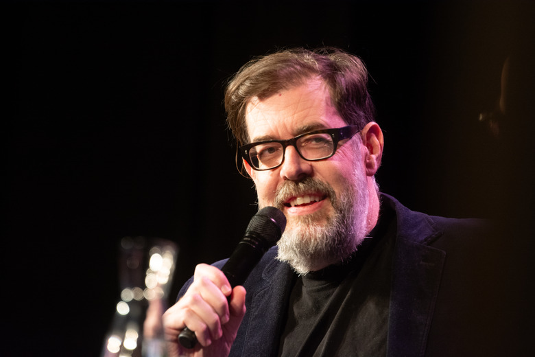 Richard Osman, an English television presenter, and Alexander Menden, a German writer, are seen on the stage of Volksbuhne am Rudolfplatz in Cologne, Germany, on March 25, 2025, during the lit.cologne festival, the international literature festival (Photo by Ying Tang/NurPhoto via Getty Images).