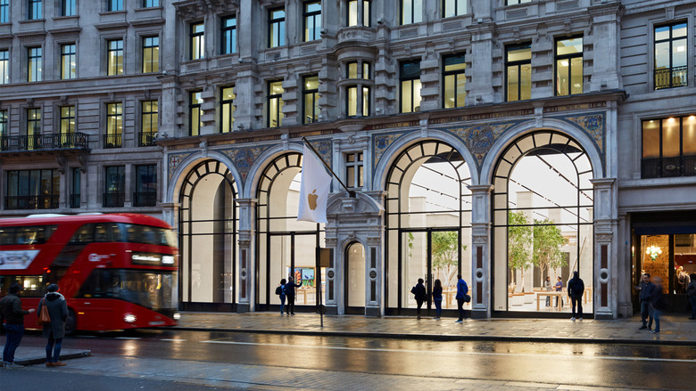 Front view of the Regents Street Apple Store in London. An Apple flag is posted above the entry.