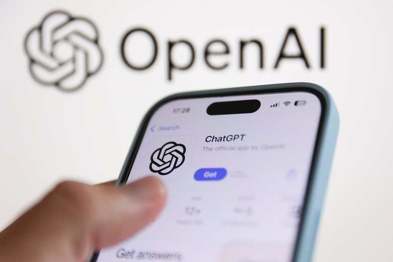 OpenAI logo displayed on a laptop screen and ChatGPT on AppStore displayed on a phone screen are seen in this illustration photo taken in Poland on August 8, 2024. (Photo by Jakub Porzycki/NurPhoto via Getty Images)