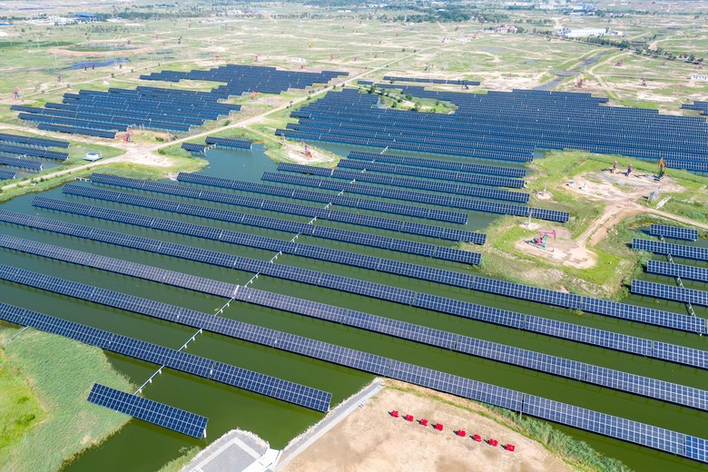An aerial drone photo taken on Aug. 8, 2024 shows the Xinghuo Water Surface Photovoltaic Demonstration Project of Daqing Oilfield in Daqing, northeast China's Heilongjiang Province. In recent years, China's northeast region has been accelerating the layout of the clean energy industry based on the resource advantages, speeding up the development of clean energy generation such as wind, solar and hydrogen energy to promote the full revitalization of northeast China. (Photo by Zhang Tao/Xinhua via Getty Images)