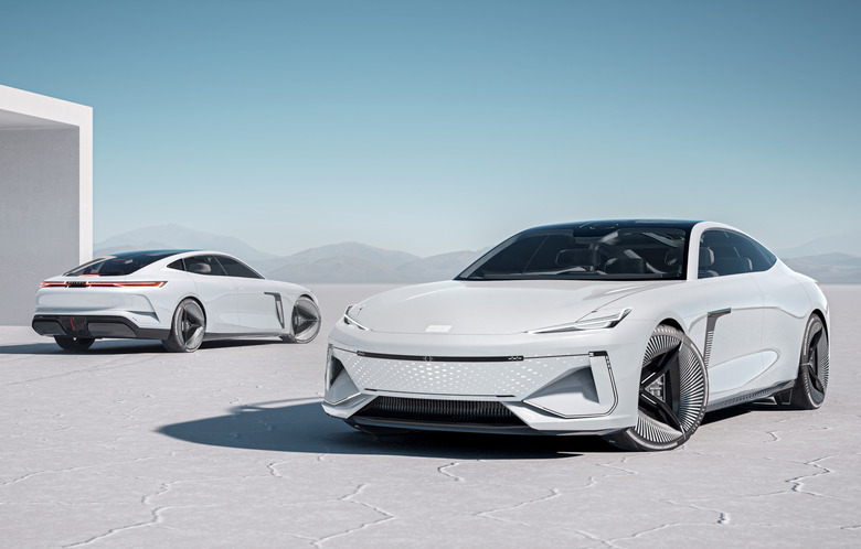 White sedans against the sky.