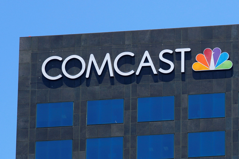 FILE PHOTO: The Comcast NBC logo is shown on a building in Los Angeles, California, U.S. June 13, 2018. REUTERS/Mike Blake/File Photo