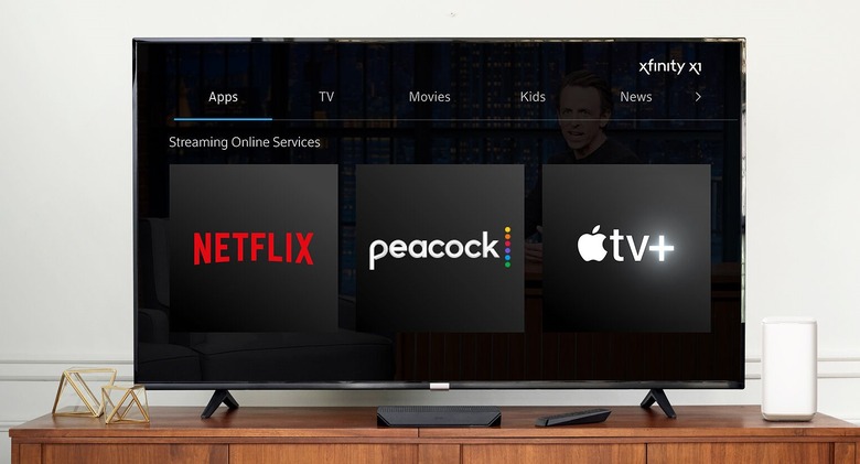A TV showing the logos for Netflix, Peacock and Apple TV+.
