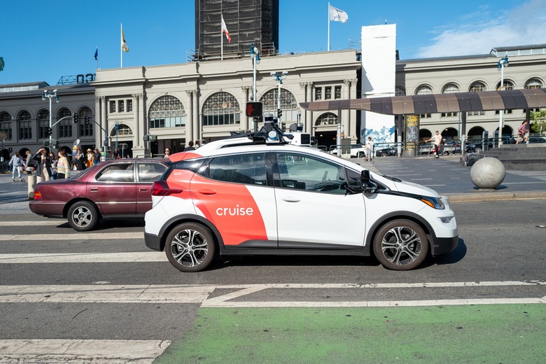 A General Motors Cruise self driving car, often referred to as a robotaxi, drives in front of the Ferry Building on the Embarcedero, San Francisco, California, August 17, 2023. (Photo by Smith Collection/Gado/Getty Images)