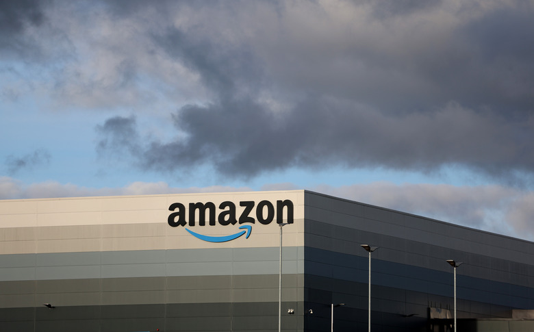 HAYDOCK, ENGLAND - OCTOBER 15: The Amazon logo is displayed outside Amazon UK MAN8 Warehouse on October 15, 2023 in Haydock, United Kingdom. (Photo by Nathan Stirk/Getty Images)