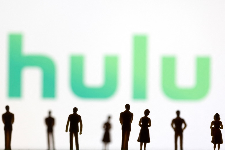 Toy figures of people are seen in front of the displayed Hulu logo, in this illustration taken January 20, 2022. REUTERS/Dado Ruvic/Illustration