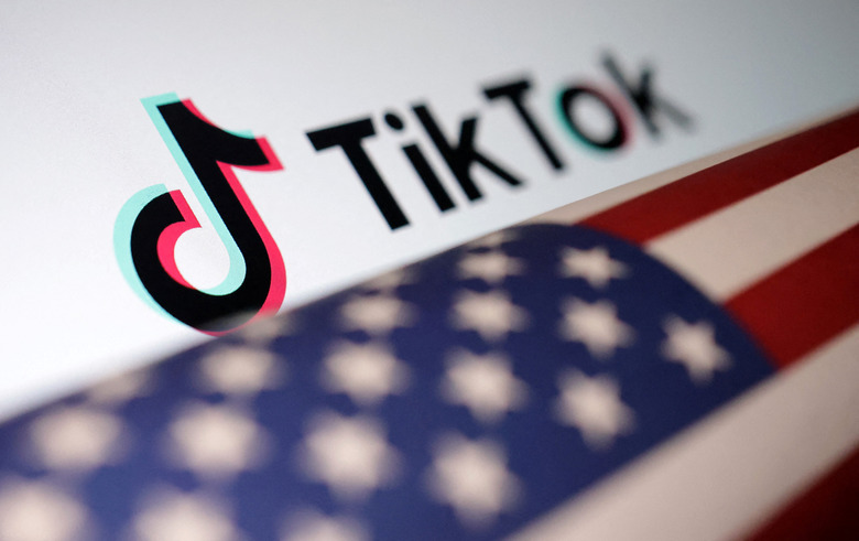 U.S. flag is placed on a TikTok logo in this illustration taken March 20, 2024. REUTERS/Dado Ruvic/Illustration