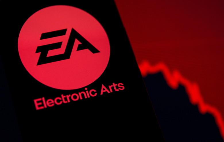 A smartphone with the Electronic Arts logo is seen in front of a displayed stock graph in this illustration taken September 16, 2021. REUTERS/Dado Ruvic/Illustration
