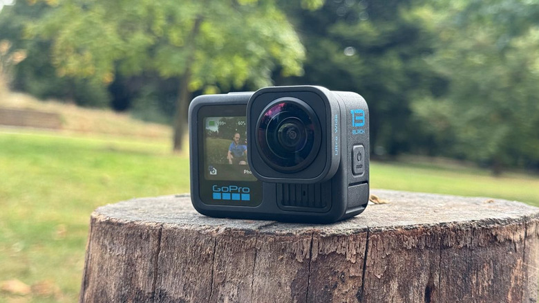 A camera on a tree stump.