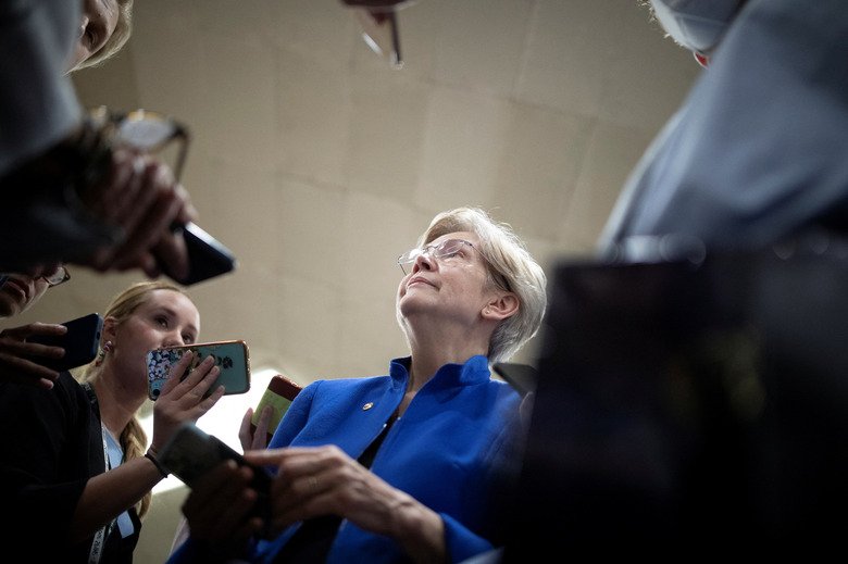 U.S. Senator Elizabeth Warren (D-MA) speaks to journalists during a vote on Capitol Hill in Washington, U.S., September 8, 2022. REUTERS/Tom Brenner