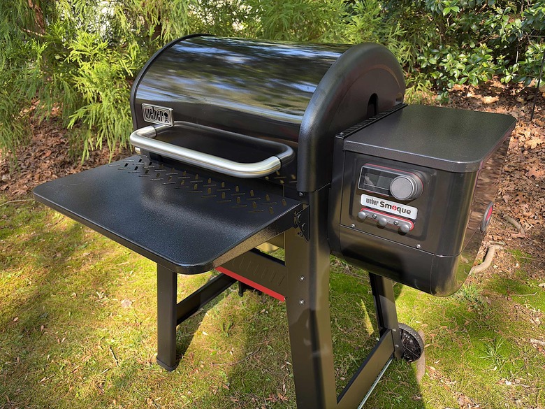 The optional front shelf comes in handy for resting pans. 