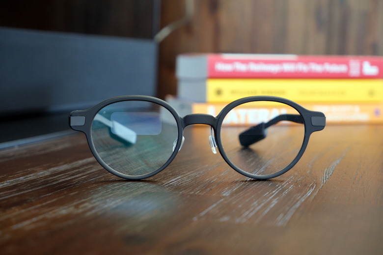 Image of the Even Realities G1 on a wooden table. 