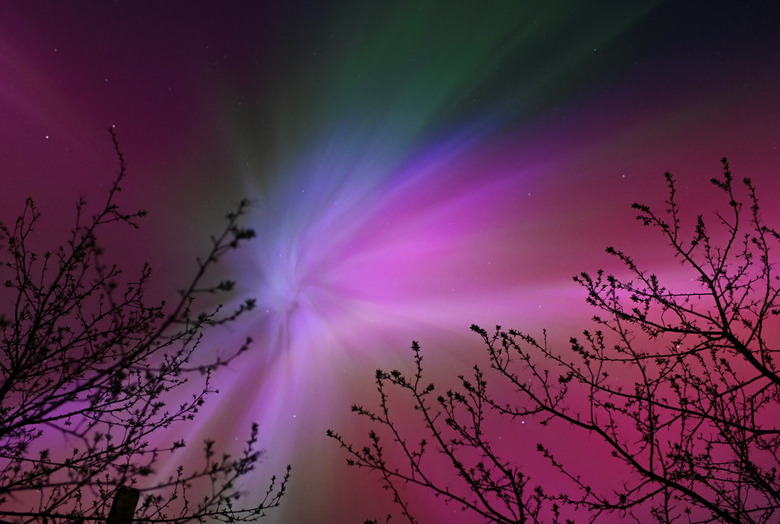 The aurora borealis, also known as the 'northern lights’, caused by a coronal mass ejection on the Sun, illuminate the skies over the southwestern Siberian town of Tara, Omsk region, Russia May 11, 2024. REUTERS/Alexey Malgavko