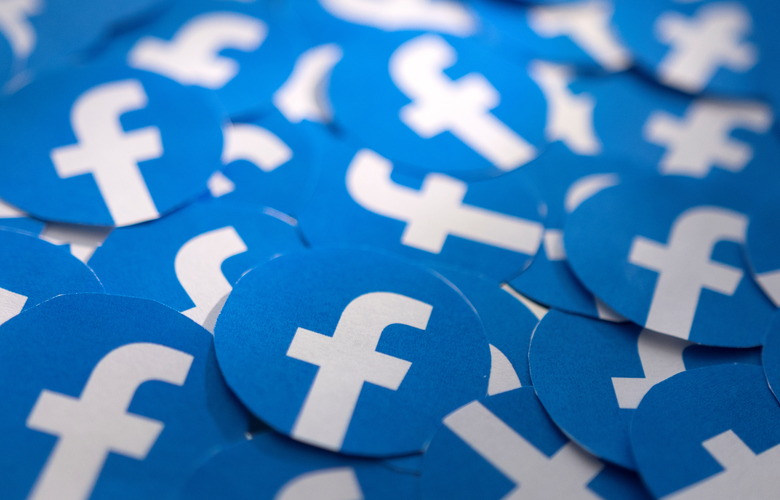 Printed Facebook logos are seen in this illustration taken February 15, 2022. REUTERS/Dado Ruvic/Illustration