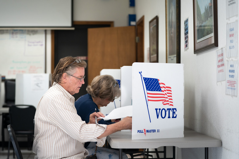 MT. GILEAD, NC - MAY 17: A man fills out a ballot at a voting booth on May 17, 2022 in Mt. Gilead, North Carolina. North Carolina is one of several states holding midterm primary elections. (Photo by Sean Rayford/Getty Images)